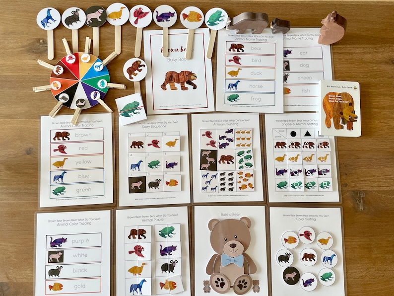May include: A set of educational activity cards featuring the children's book "Brown Bear, Brown Bear, What Do You See?" The cards include activities such as animal name tracing, color sorting, animal counting, and a build-a-bear puzzle.