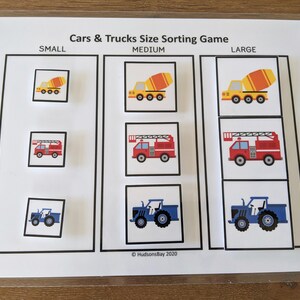 May include: A printable game for kids to sort cars and trucks by size. The game includes three sizes: small, medium, and large. The images include a yellow cement mixer, a red fire truck, and a blue tractor.