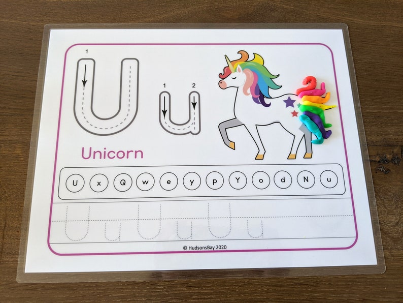 May include: A printable worksheet for learning the letter U. The worksheet features a unicorn with a rainbow mane and tail, a dotted line tracing the letter U, and a section for practicing writing the letter U.