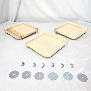 May include: Three unfinished wooden shelves with rounded edges and a set of mounting hardware, including screws and washers.