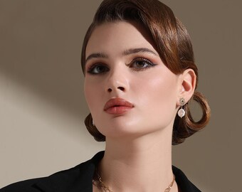 Pendentif charm doré, perle d'eau douce, acier plaqué or 18 carats