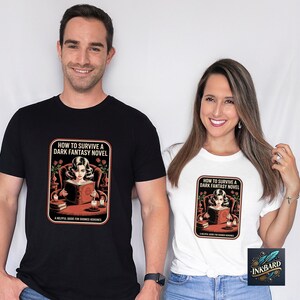 A man and a woman are standing next to each other, both wearing t-shirts with a graphic design.