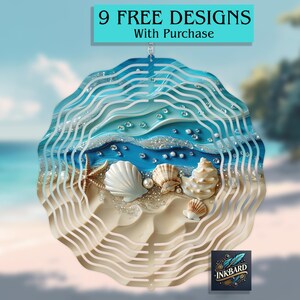 May include: A metal wind spinner with a beach scene design. The spinner features blue waves, white sand, seashells, and pearls. The text "9 FREE DESIGNS With Purchase" is at the top of the image.