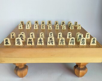 Shogi traditional board game(Japanese chess) wood board table and  Koma(pieces)