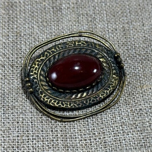 Vintage women&#39;s stylish brooch. Jewelry for her in retro style