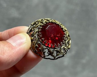 Vintage brooch, accessory for her, costume jewelry. Brooches with a red stone, retro