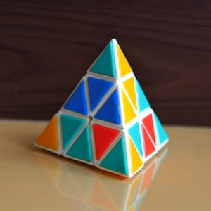 Vintage Cube - Rubik. logic games, 3D pyramids, triangle cube, puzzle game, 1980s