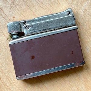 antique small gas lighter in USSR brown color