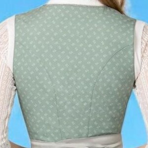 May include: Back view of a light green vest with a subtle floral pattern. The vest has white straps and a light grey waistband. The vest is worn over a white lace shirt.