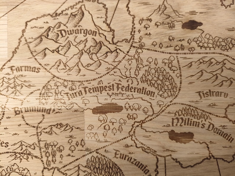 May include: A light brown wooden board with a laser-etched fantasy map. The map features various regions labeled 'Dwargon,' 'Tura Tempest Federation,' 'Tistrary,' 'Milim's Domain,' 'Farmas,' 'Bruning,' and 'Eurazania.'  The map includes mountains, forests, and bodies of water, rendered in a vintage style.  The map's design is reminiscent of a medieval or fantasy setting.