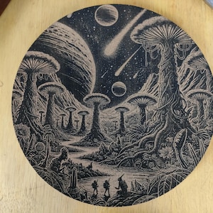 May include: Black and white illustration of a fantastical forest scene with large mushrooms, trees, and a river. The scene is set against a starry night sky with planets and shooting stars. There are small figures of people walking in the forest.