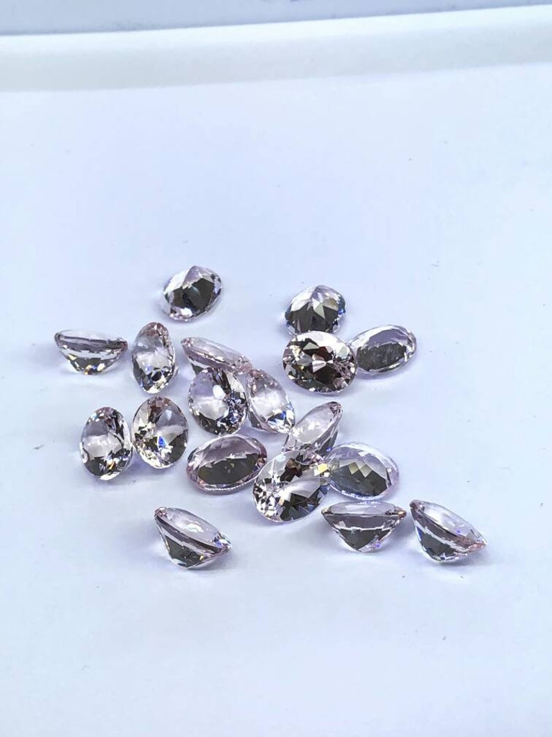 Natural pink morganite faceted semiprecious stone 8x10 mm in oval shape