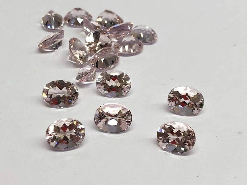Natural pink morganite faceted semiprecious stone 8x10 mm in oval shape