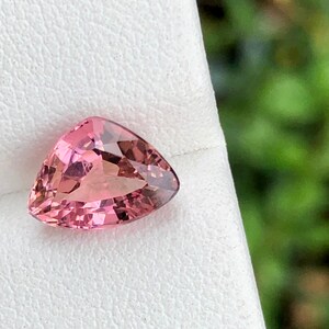 Natural pink tourmaline faceted semiprecious gemstone in fancy shape