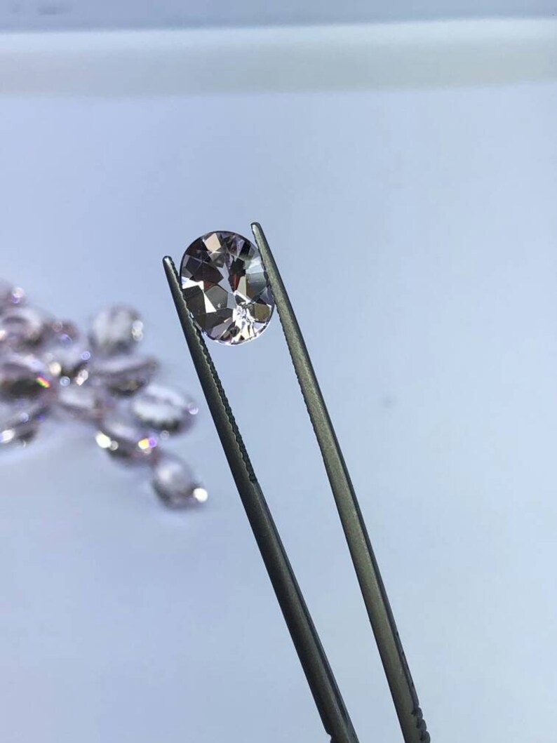 Natural pink morganite faceted semiprecious stone 8x10 mm in oval shape