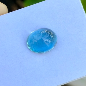 Natural premium quality santamaria aquamarine cabochon semiprecious gemstone in oval shape for very fine jewelry
