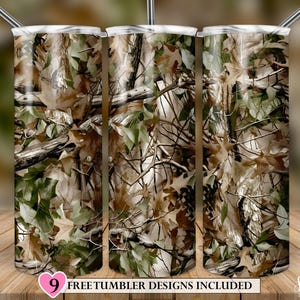 May include: Three stainless steel tumblers with a camouflage pattern of brown, green, and tan leaves and branches. Each tumbler has a silver straw. The bottom of the image has a banner with the text "9 Free Tumbler Designs Included".
