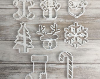 Christmas cookie cutters: Christmas tree, Santa Claus, snowflake, little biscuit, reindeer, snowman, .... (Your choice)