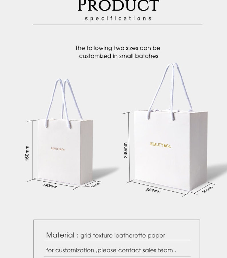 May include: Two white paper shopping bags with rope handles. The smaller bag is 160mm high, 140mm wide, and 60mm deep. The larger bag is 230mm high, 200mm wide, and 80mm deep. Both bags have the text "BEAUTY & Co." in gold.