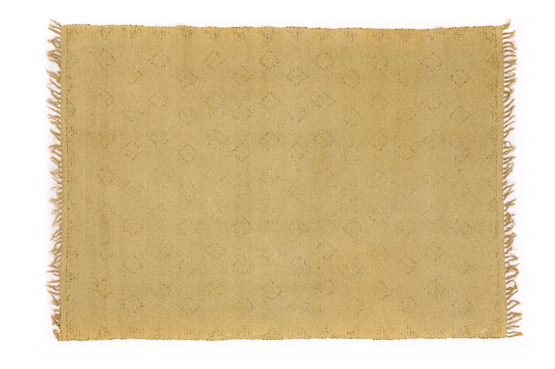 May include: A light brown rug with a diamond pattern woven into the fabric. The rug has a fringe border.