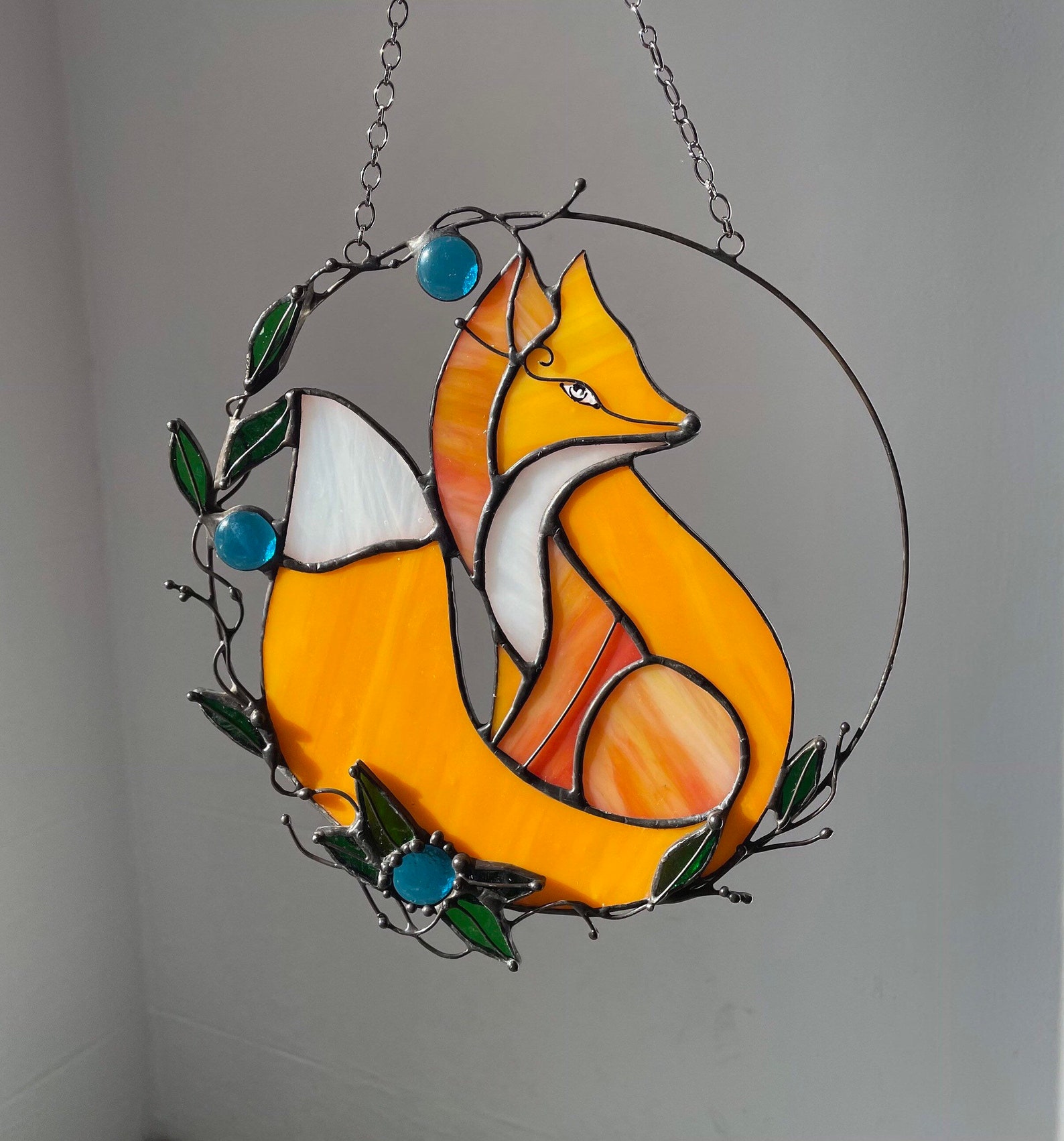round yellow fox suncatcher made of stained glass