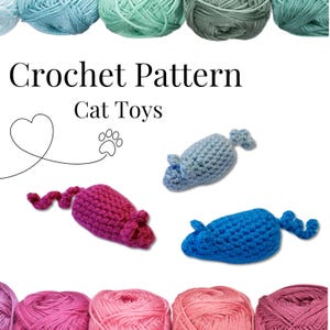 May include: Crochet pattern for cat toys. The image shows three crocheted cat toys in pink, blue, and light blue. The toys are shaped like mice. The image also shows balls of yarn in various colors.