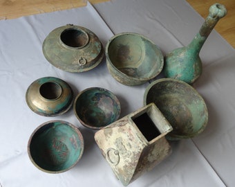 A set of 8 pieces archaic bronze food vessels and steamers Han Dynasty, 207 BC/220 AD