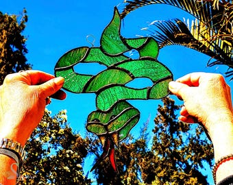 Vetro colorato serpente verde