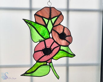 Three stained glass purple flowers