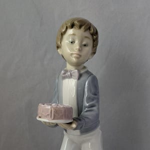 Lladro Nao Collectable Figure - Boy With Cake - #1131 - Slight Damage