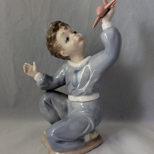 Collectable Lladro Nao Boy With An Aeroplane - &quot;Jet Pilot&quot; #1133