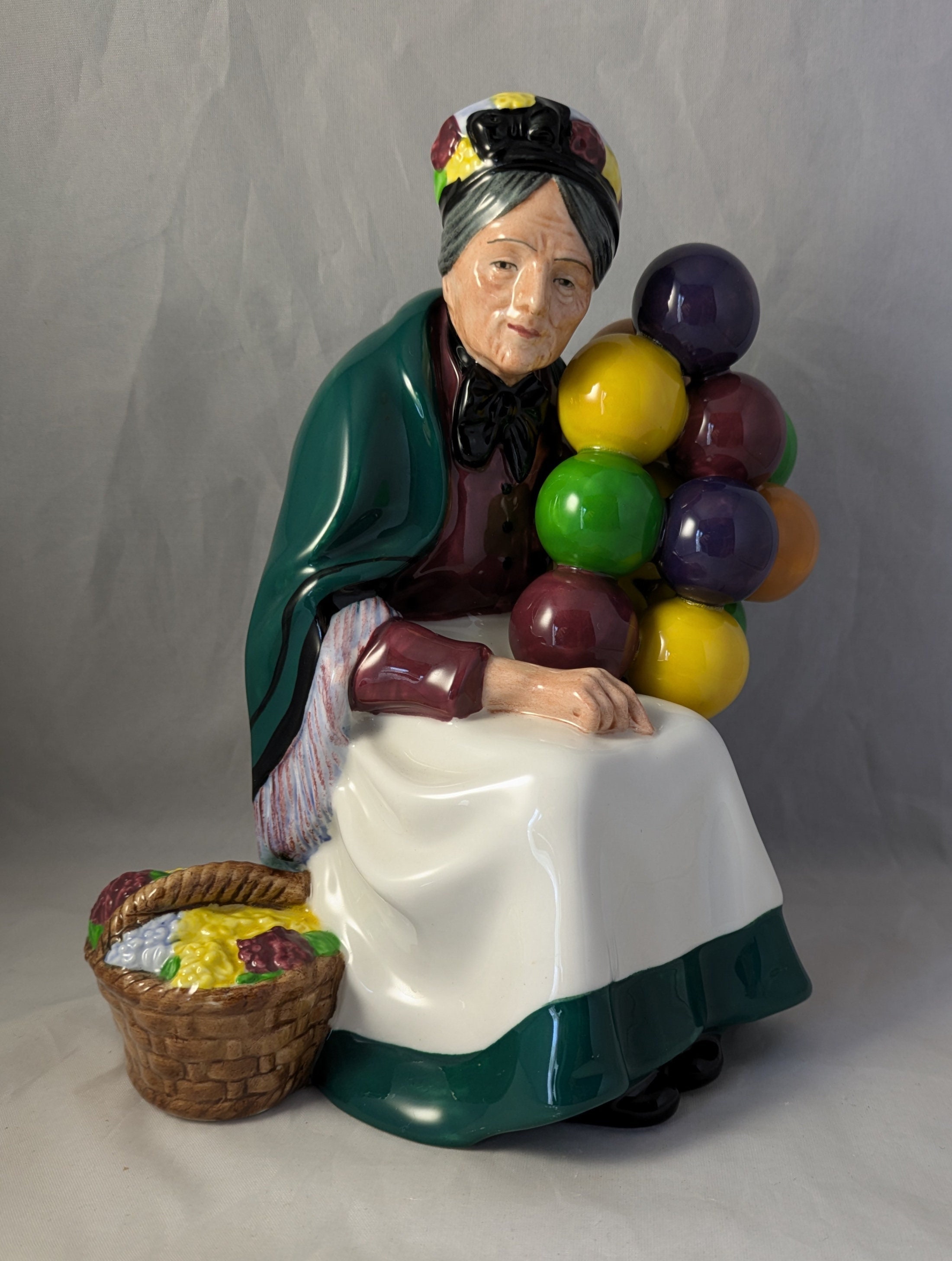 Royal Doulton Collectable Figurine - the Old Balloon Seller Royal Doulton Collectable Figurine - the Old Balloon Seller