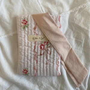 Kindle sleeve, e-reader cover, padded Kindle case, ribbon tie Kindle sleeve, handmade Kindle cover, elegant Kindle sleeve, fabric e-reader case, custom Kindle sleeve, gift for book lovers, travel Kindle pouch