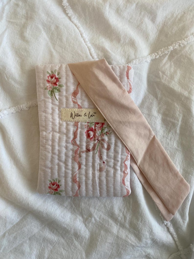 Kindle sleeve, e-reader cover, padded Kindle case, ribbon tie Kindle sleeve, handmade Kindle cover, elegant Kindle sleeve, fabric e-reader case, custom Kindle sleeve, gift for book lovers, travel Kindle pouch