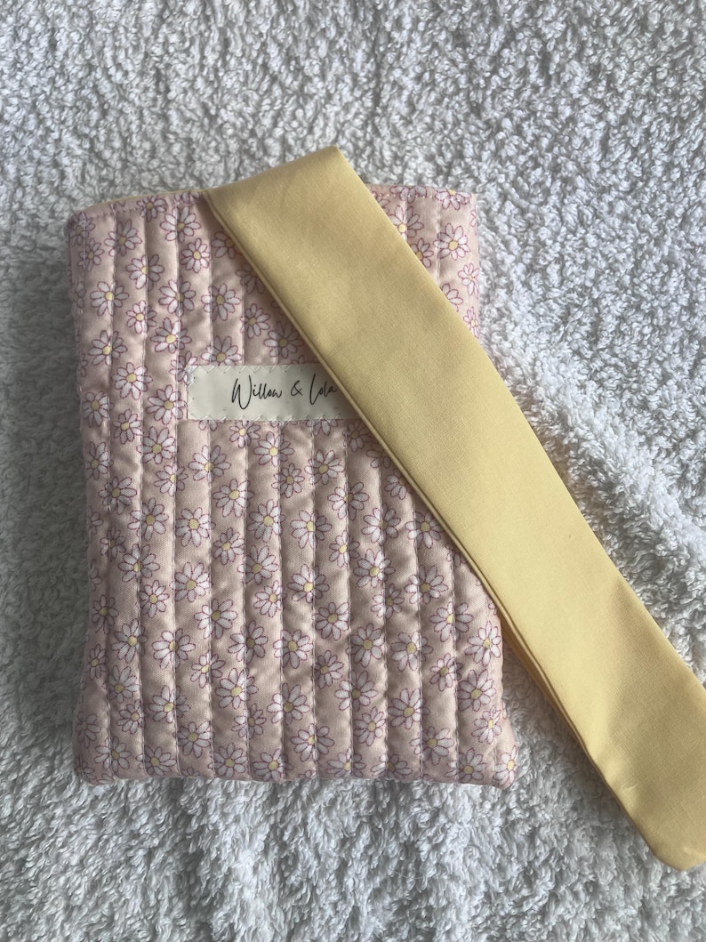 Kindle sleeve, e-reader cover, padded Kindle case, ribbon tie Kindle sleeve, handmade Kindle cover, elegant Kindle sleeve, fabric e-reader case, custom Kindle sleeve, gift for book lovers, travel Kindle pouch
