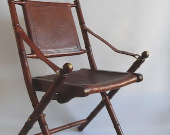 Campaign chair, officer's chair made of teak in bamboo style with stitched leather seat and brass details - 1960s