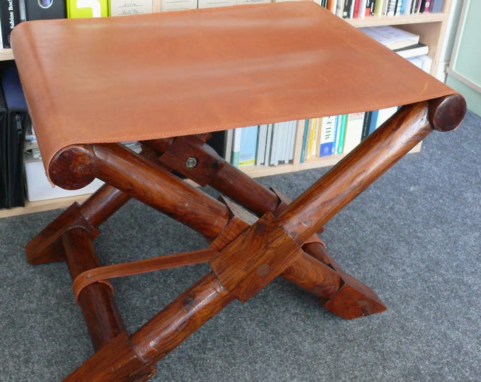Large folding stool, scissor stool made of solid rosewood with leather seat, 20th century.