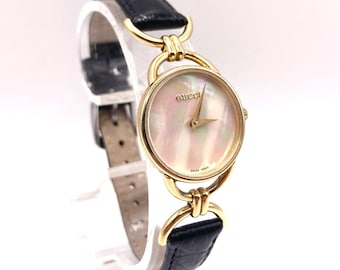 Gucci watch 6000L with exclusive mother of pearl dial