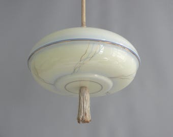 Art Deco rod pendant light with brass suspension and decorative glass shade
