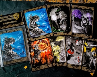 May include: A Zelda Tarot Adventure Set expansion pack featuring multiple illustrated cards with gold-toned borders. The cards display various fantasy scenes, including characters in blue, orange, and black-and-white ink styles with text labels like Trip, Flame, Armadillo, Scurry, Fowl, and Heist.