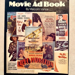 May include: A vintage movie advertisement book titled "The Movie Ad Book" by Malcolm Vance. The cover features a collage of classic movie posters, including "Lost Horizon" and "Ball of Fire", with various actors and film titles.