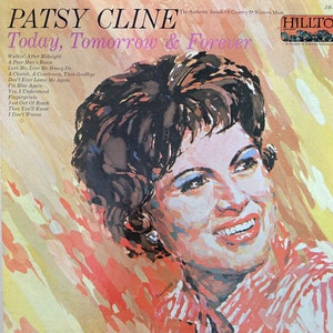 May include: A vintage vinyl record cover featuring a colorful portrait of Patsy Cline, a country music singer. The cover is titled "Patsy Cline Today, Tomorrow & Forever" and features the text "The Authentic Sounds of Country & Western Music".