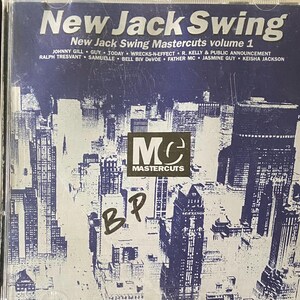 May include: A CD case with a cityscape background and the text "New Jack Swing Mastercuts volume 1" printed on the front. The case features a list of artists including Johnny Gill, Guy, Today, Wrecks-N-Effect, R. Kelly & Public Announcement, Ralph Tresvant, Samuelle, Bell Biv Devoe, Father MC, Jasmine Guy, and Keisha Jackson.