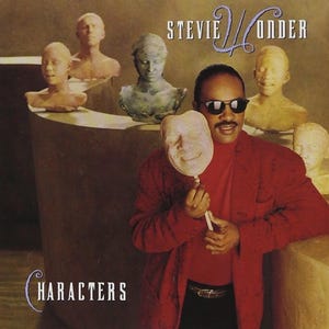 May include: Stevie Wonder album cover featuring a red-clad man holding a white mask with a smiling face. The album title "Characters" is visible in the bottom left corner. The album cover features a background of several plaster busts.