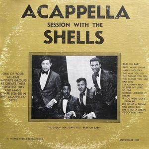 May include: A vintage record album cover featuring a photo of a vocal group, The Shells, with the album title "Session with the Shells". The album cover is yellow with black text and features the song "Baby Oh Baby" by The Shells.