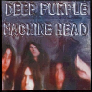 May include: A vintage album cover for Deep Purple's "Machine Head" album. The cover features a blurred image of the band members in front of a silver background with the album title in raised letters.
