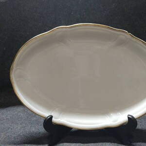 Fix-Oval Serving Platter in Gold Band by HUTSCHENREUTHER