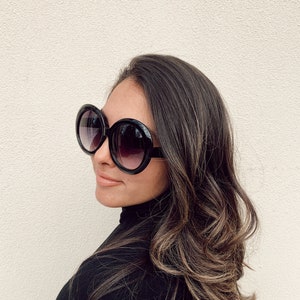 The 'Jackie O' Oversized Sunglasses Available in Black and Tortoise image 1