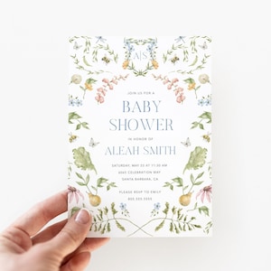 May include: A white baby shower invitation with a floral border. The invitation features a watercolor illustration of flowers, leaves, bees, and butterflies. The text reads "Join us for a Baby Shower in honor of Aleah Smith. Saturday, May 23 at 11:30 AM, 4045 Celebration Way, Santa Barbara, CA. Please RSVP to Emily 835-333-3555."