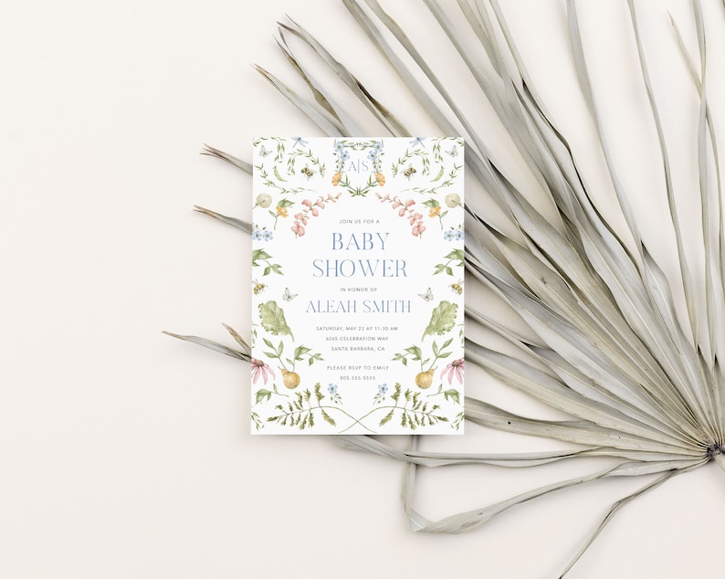 May include: A white baby shower invitation with a floral border. The invitation reads "Join us for a Baby Shower in honor of Aleah Smith. Saturday, May 13 at 11:00 am Wine Celebration Santa Barbara, CA. Please RSVP to [phone number] by [date]"